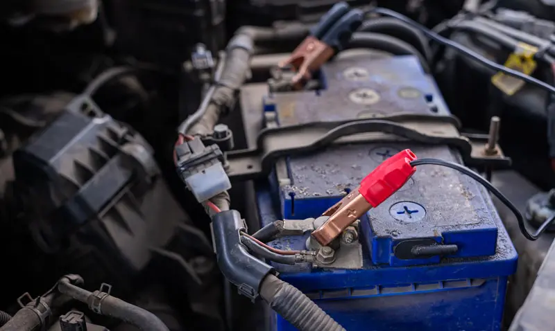 Battery-jumpstart A cars battery being jump Started